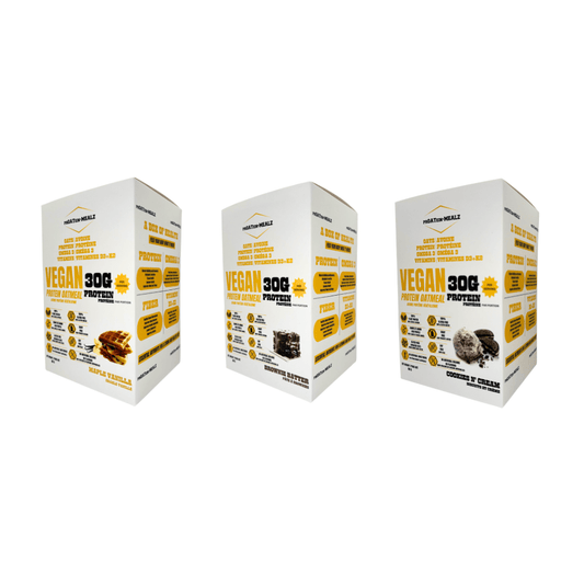 Three boxes of Proatein Mealz of Protein Oatmeal on a white background